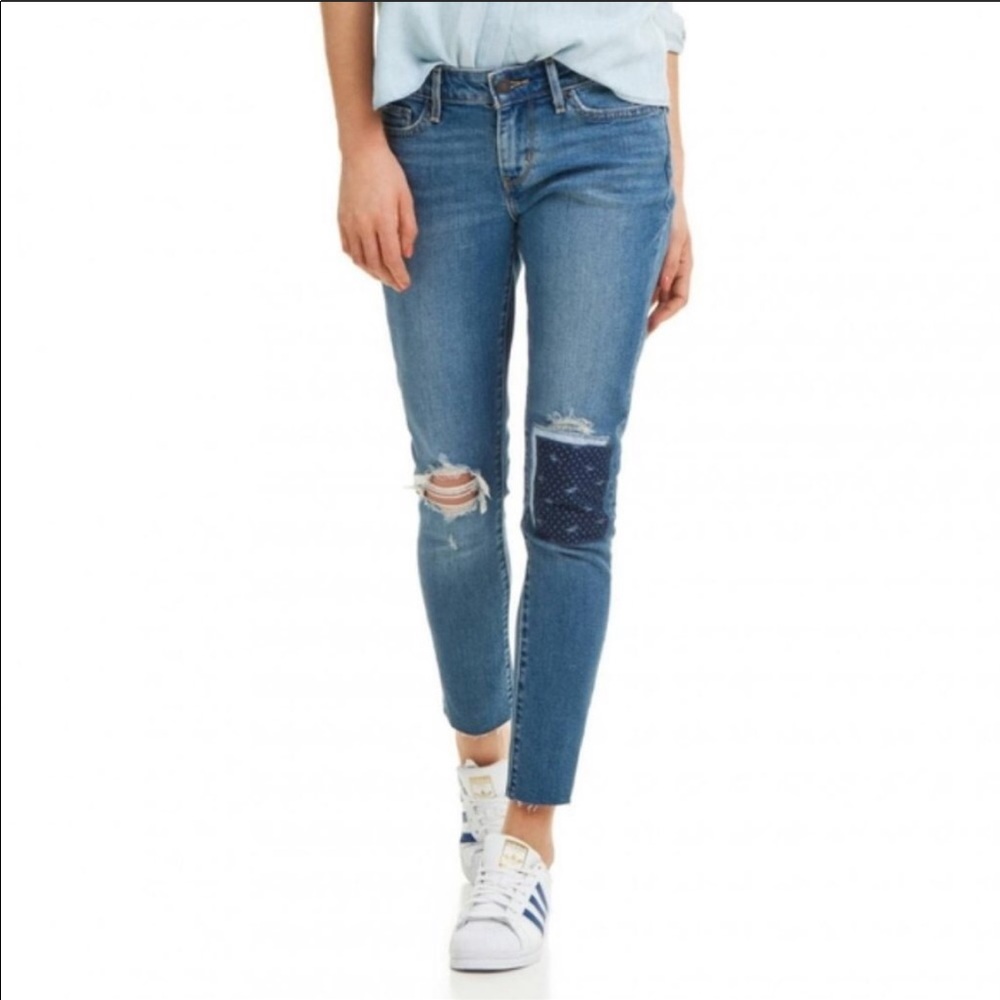 Levis patchwork busted knee 711 skinny